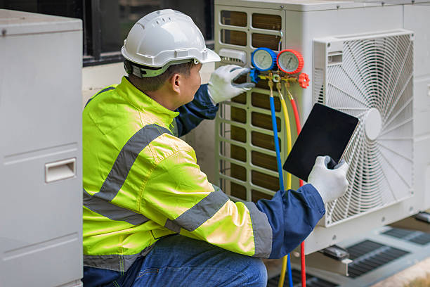 Professional Heat Pump Repair technician working in Tipton, CA